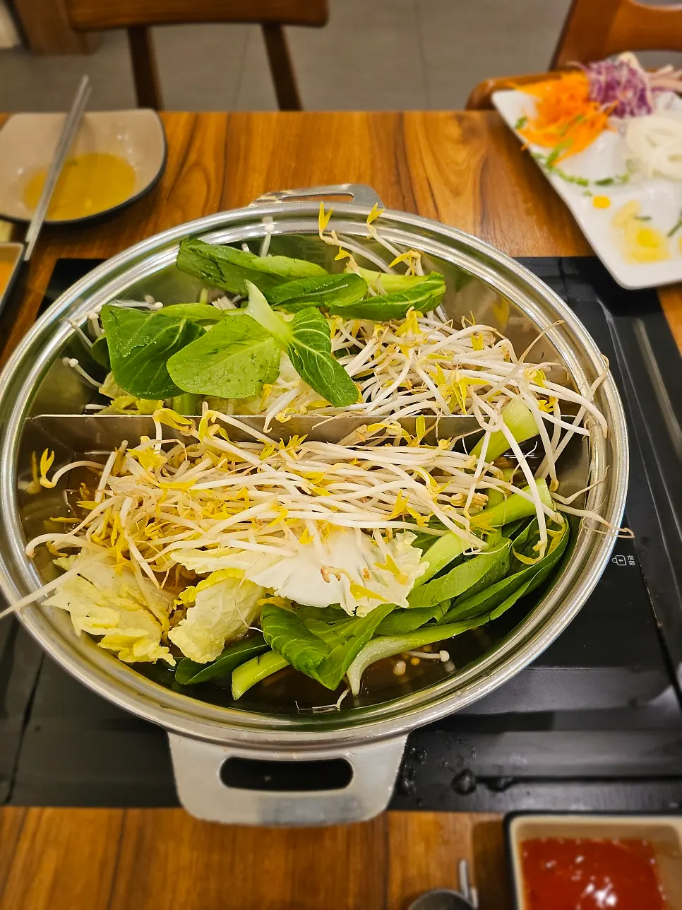 Shabu-shabu pot with half bonito, half doenjang broth