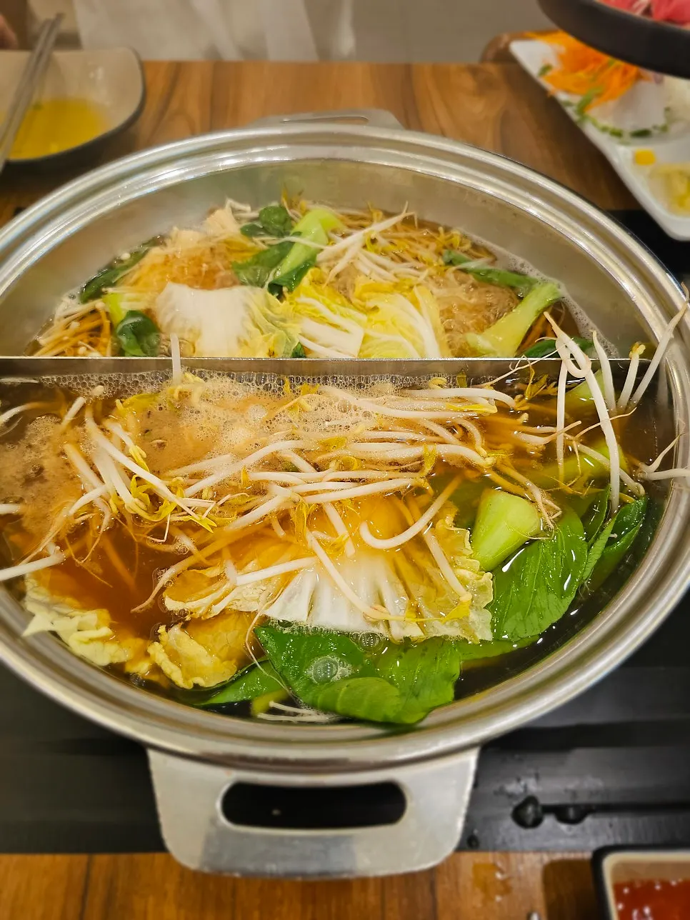 Beef cooking in the shabu-shabu pot