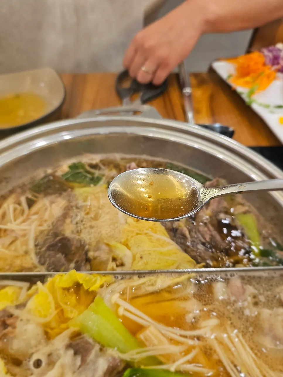 More ingredients added to the shabu-shabu pot