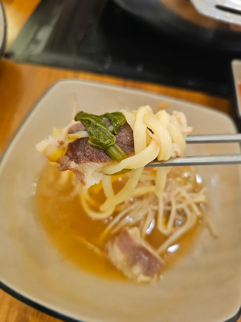 Noodles picked up together with vegetables
