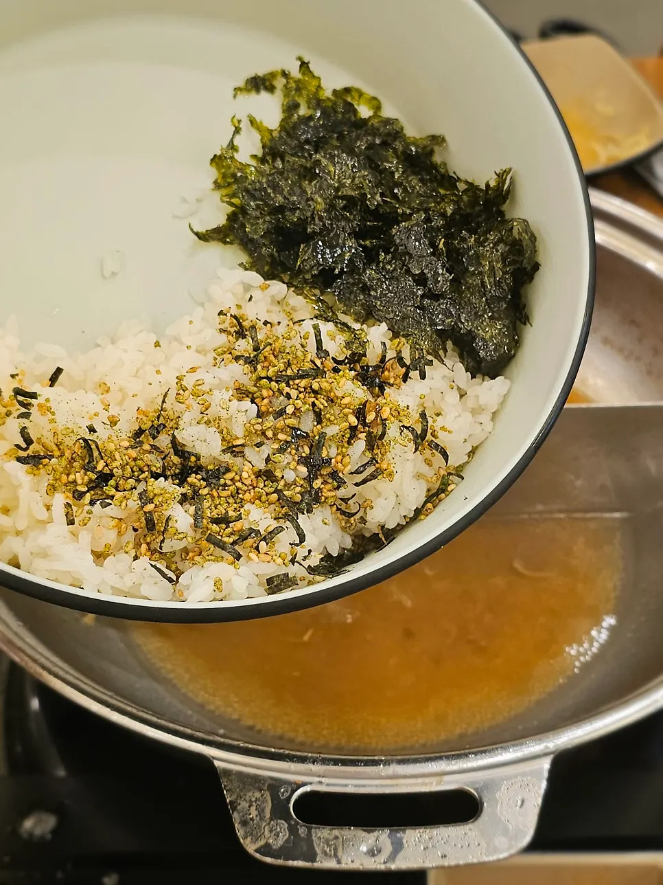 Preparing porridge with the leftover broth