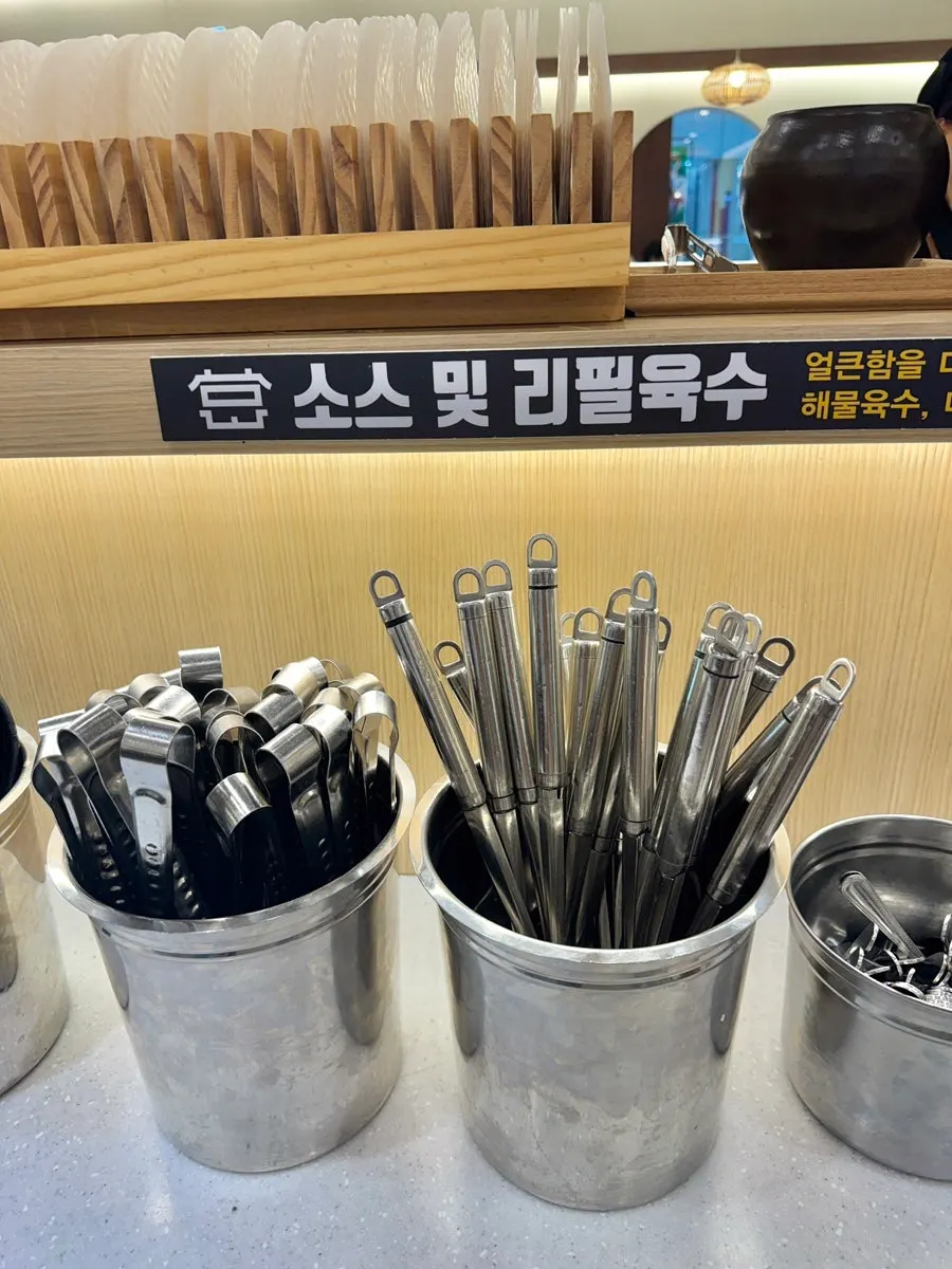 Salad bar with shabu-shabu ingredients laid out