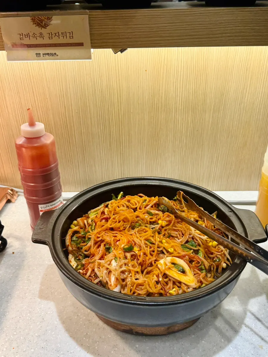 Salad bar with fried rice and fried items