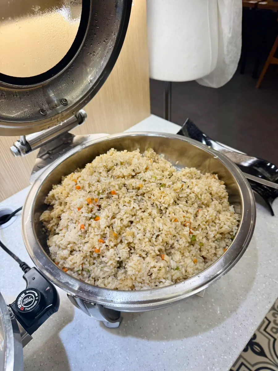 A plate of kids' food brought back to the table