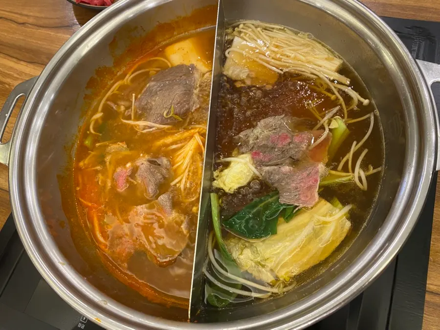 Pot of shabu-shabu with half katsuo and half spicy broth
