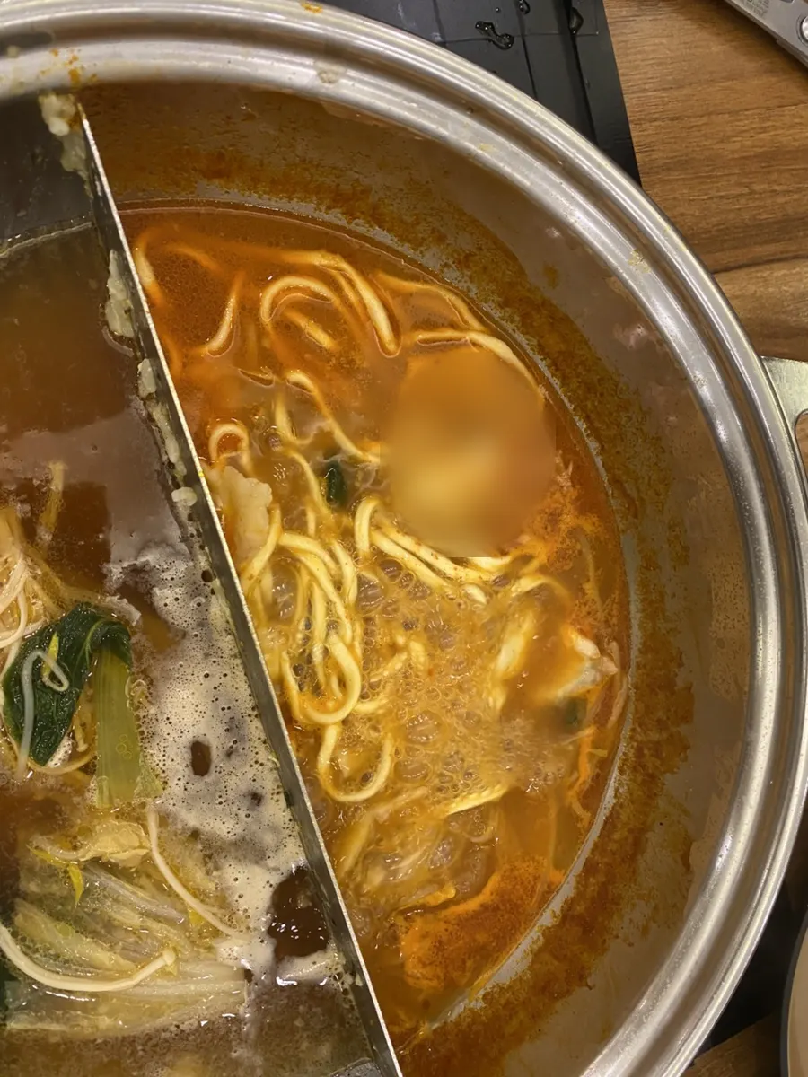 Shabu-shabu simmering with vegetables and beef