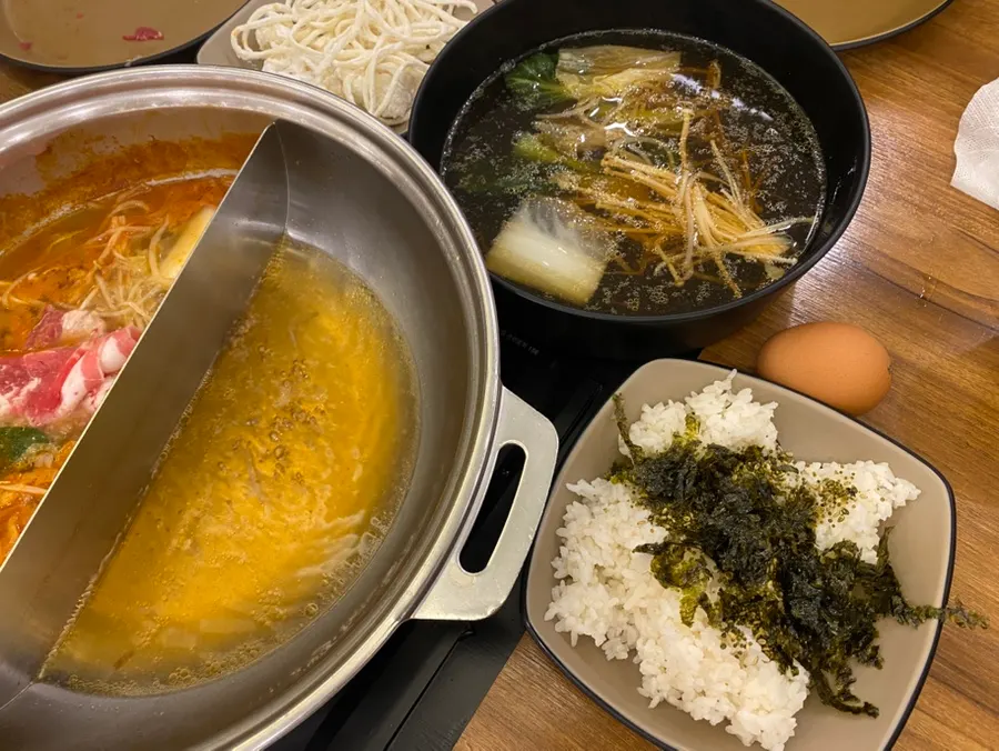 Kalguksu noodles boiled in the spicy broth