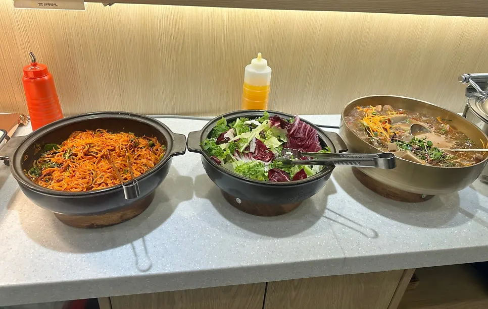 Side dishes like tteokbokki and fried rice