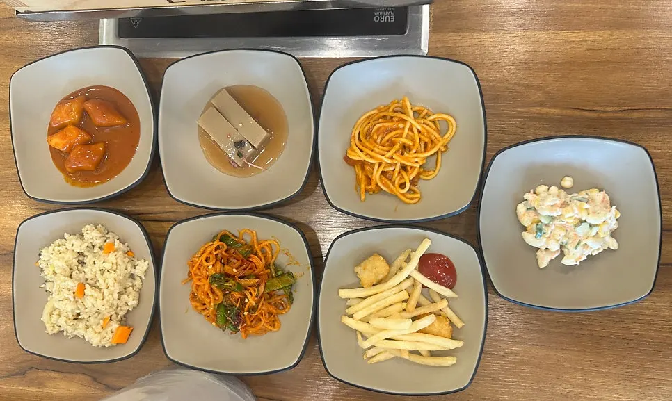 A plate of side dishes brought back to the table
