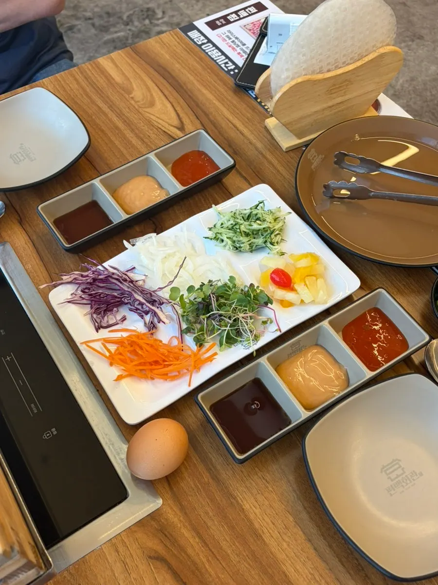 A plate loaded with rice paper roll vegetables