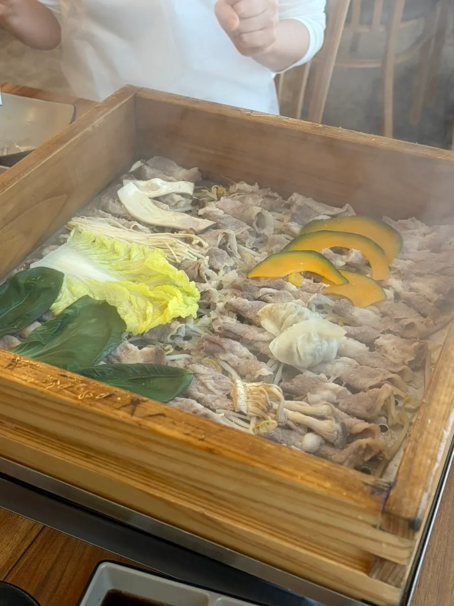 Vegetables and meat laid on a rice paper sheet