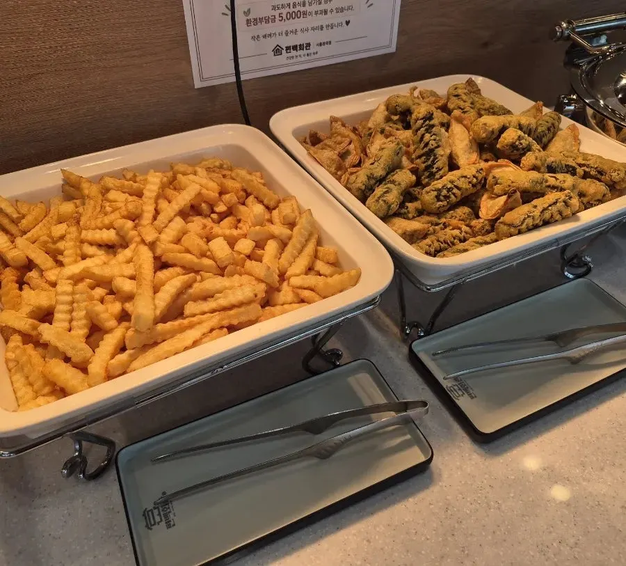 A plate piled high from the salad bar