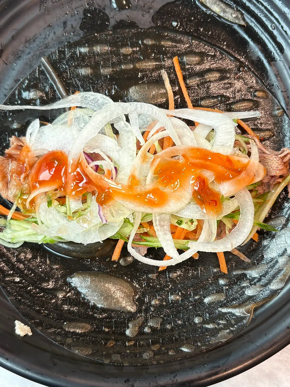 A plate of vegetables and mushrooms for spring rolls