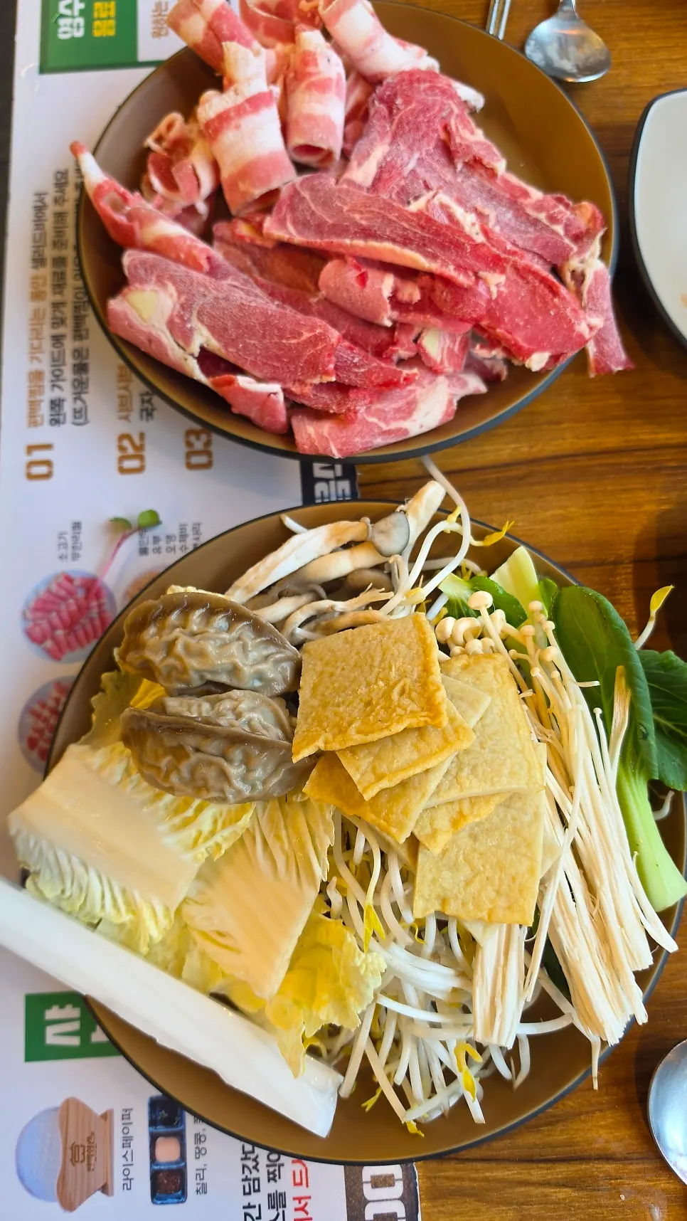 Two shabu-shabu broths starting to boil