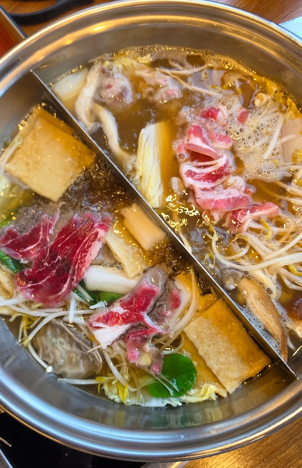 Plate of shabu-shabu ingredients from the salad bar