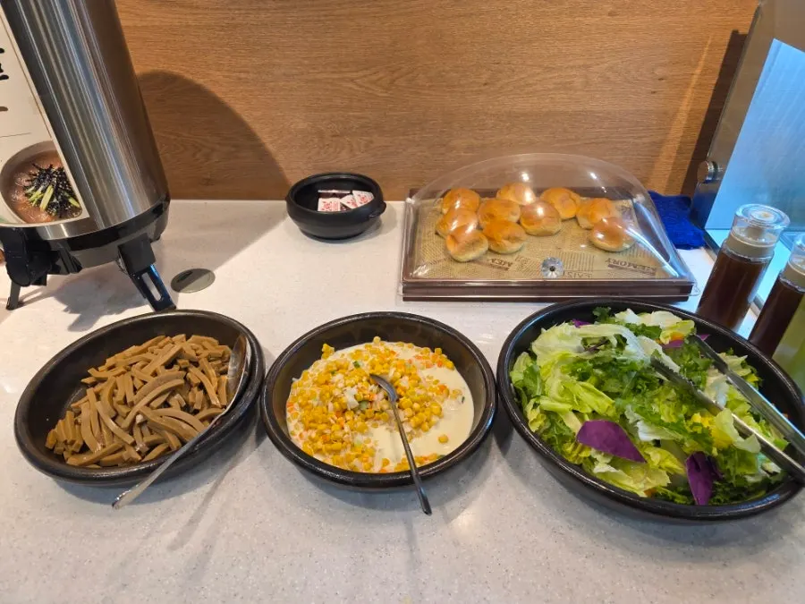 Plate of food picked up from the salad bar