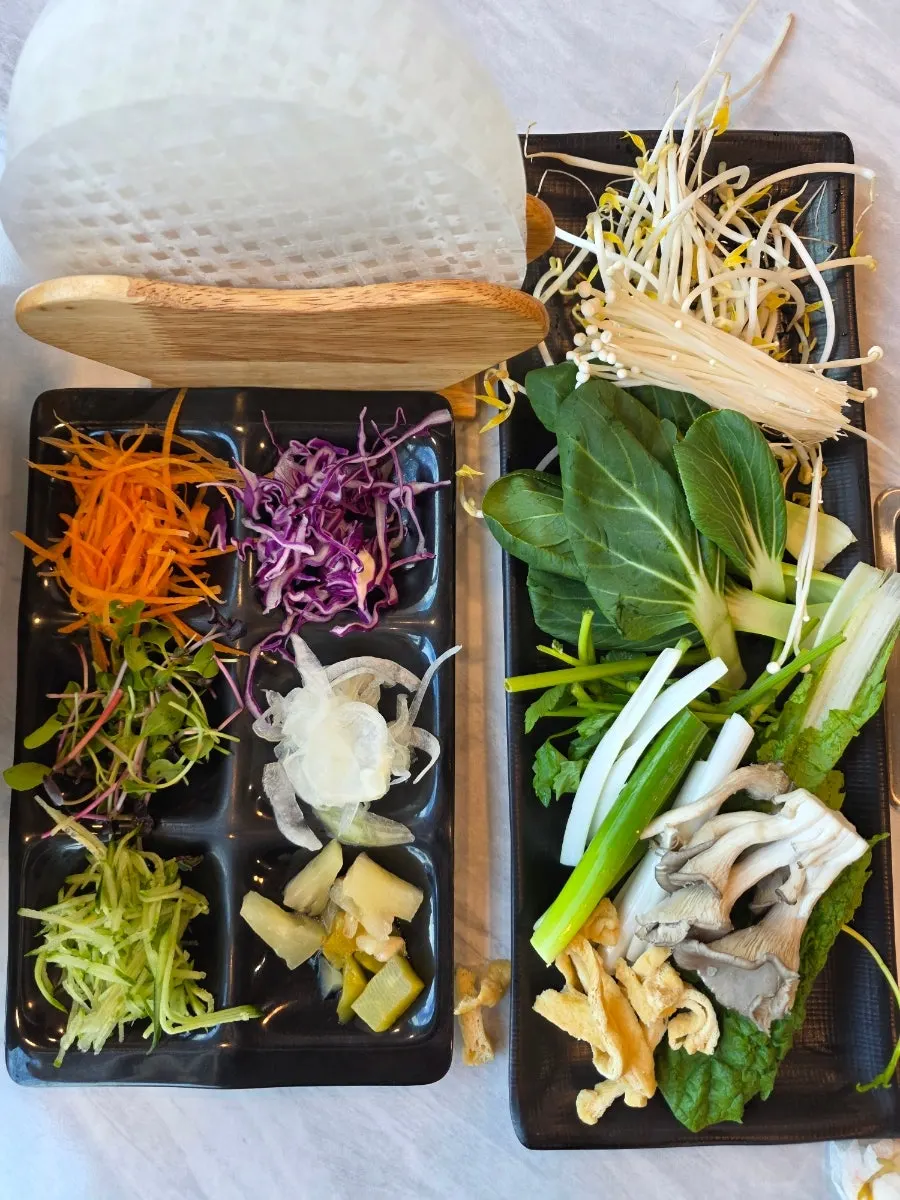 Pot of shabu-shabu simmering with two kinds of broth