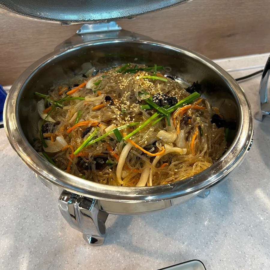 Japchae and tteokbokki corner on the salad bar
