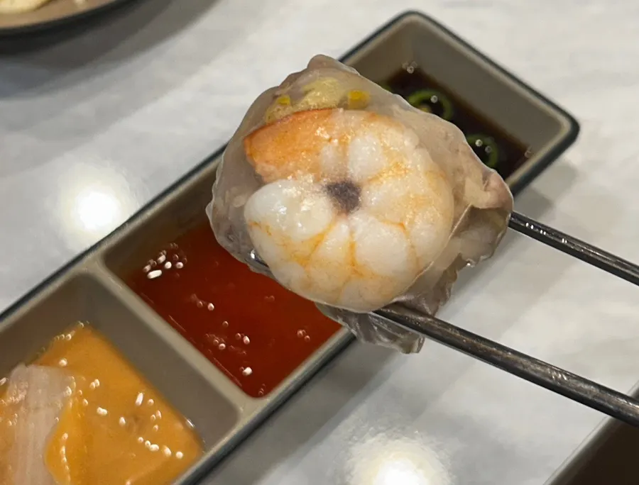 Cypress steam rolled in rice paper and dipped in sauce