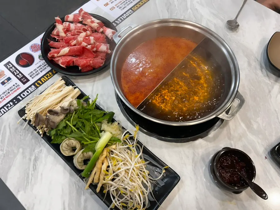 Plate of meat and vegetables for shabu-shabu