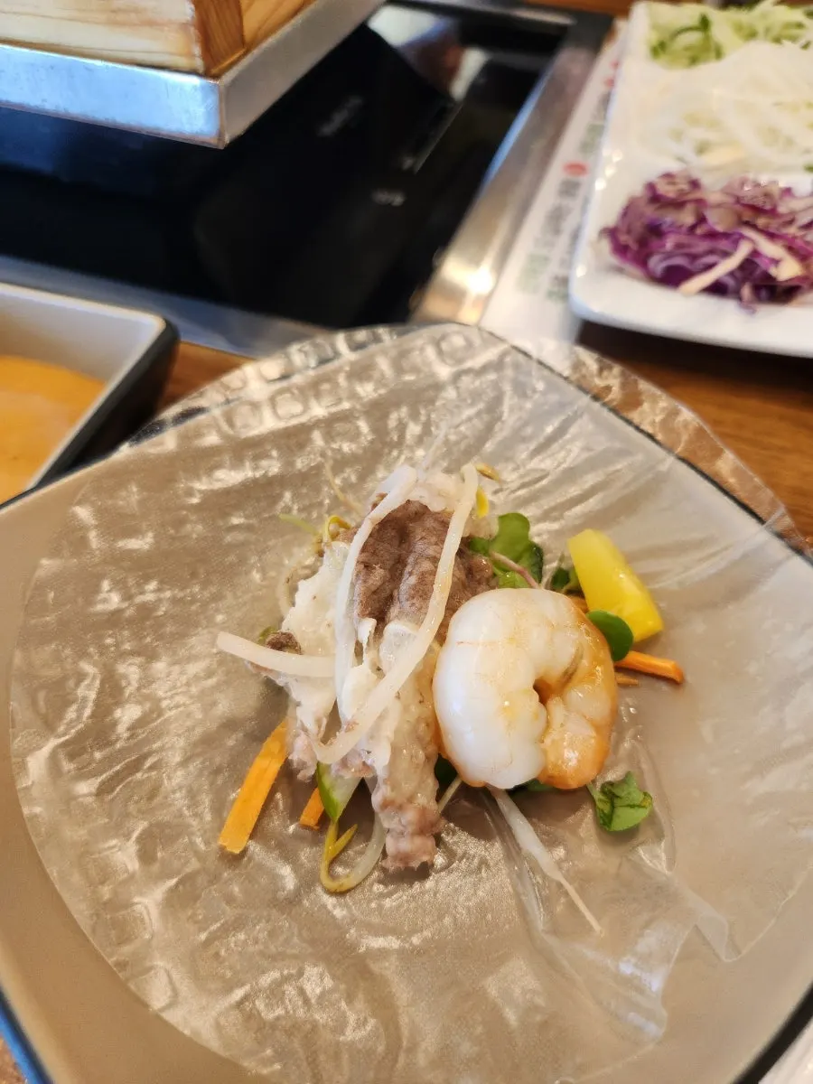 Cypress steam topped with sweet pumpkin and shrimp