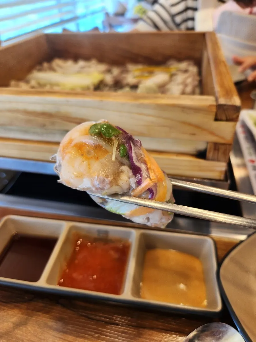 Rice-paper roll wrapped with vegetables and meat