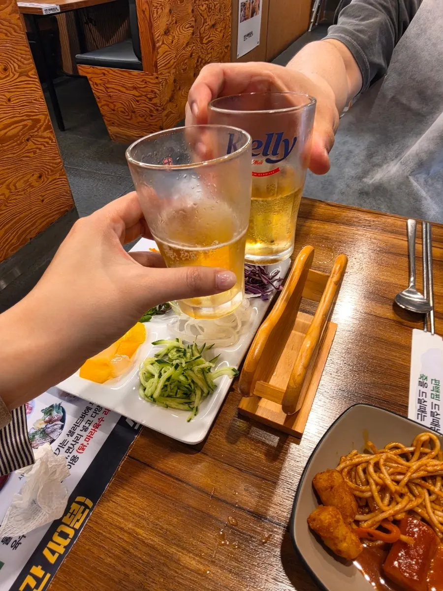 Meat and bean sprouts in a cypress wood steamer