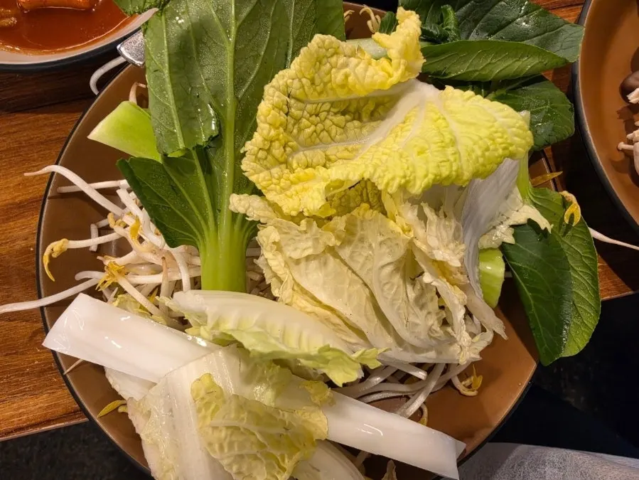 Two shabu-shabu broth pots, katsuo and doenjang chicken