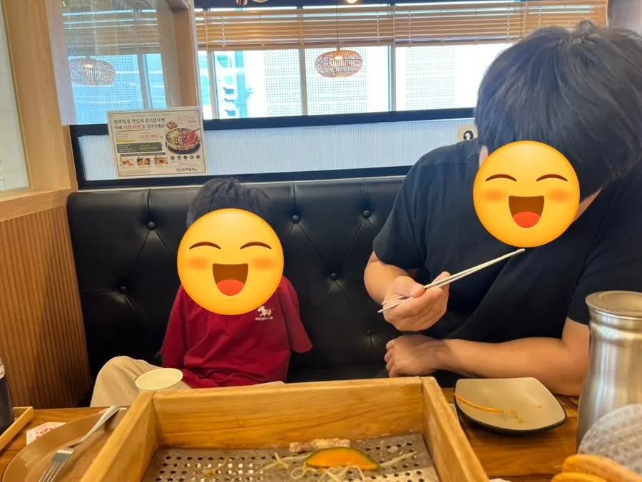 Family eating cypress steam at the table