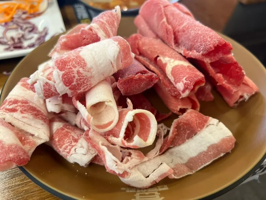 Glass noodles and vegetables added to the shabu-shabu