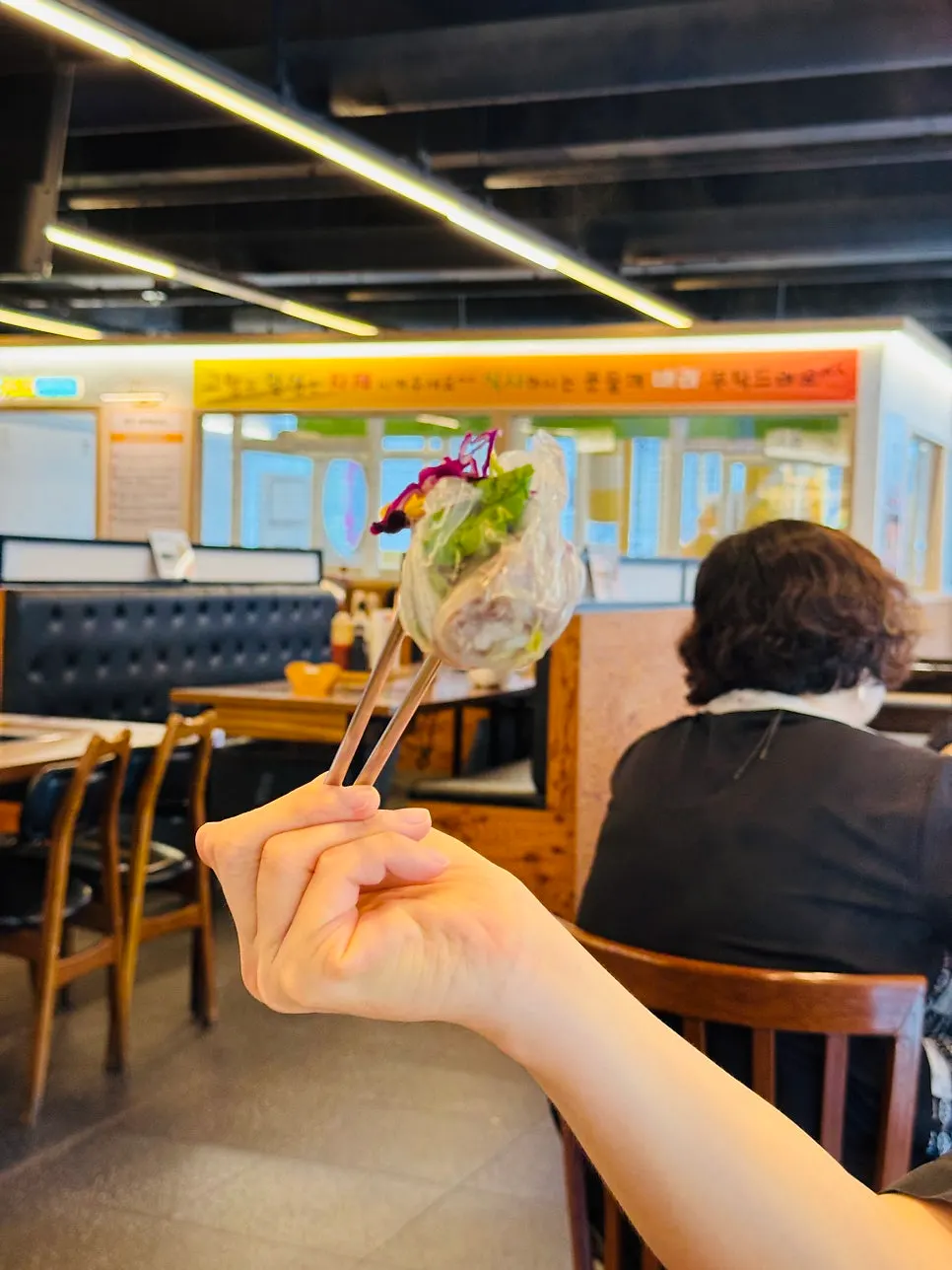 Rice paper roll dipped in peanut sauce