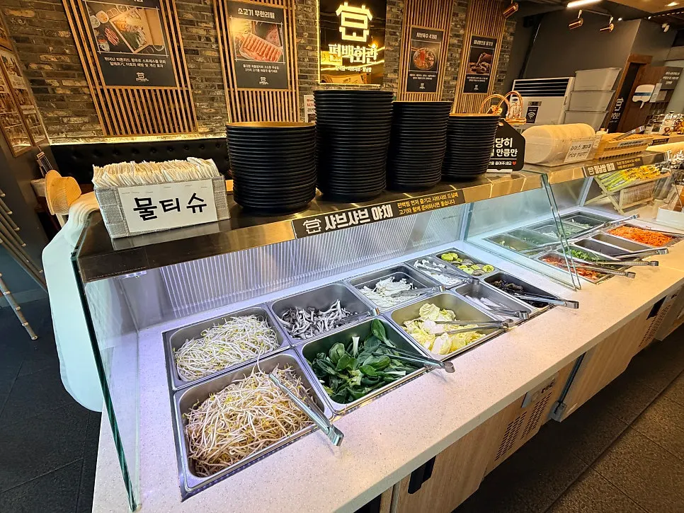 Salad bar display with fresh vegetables