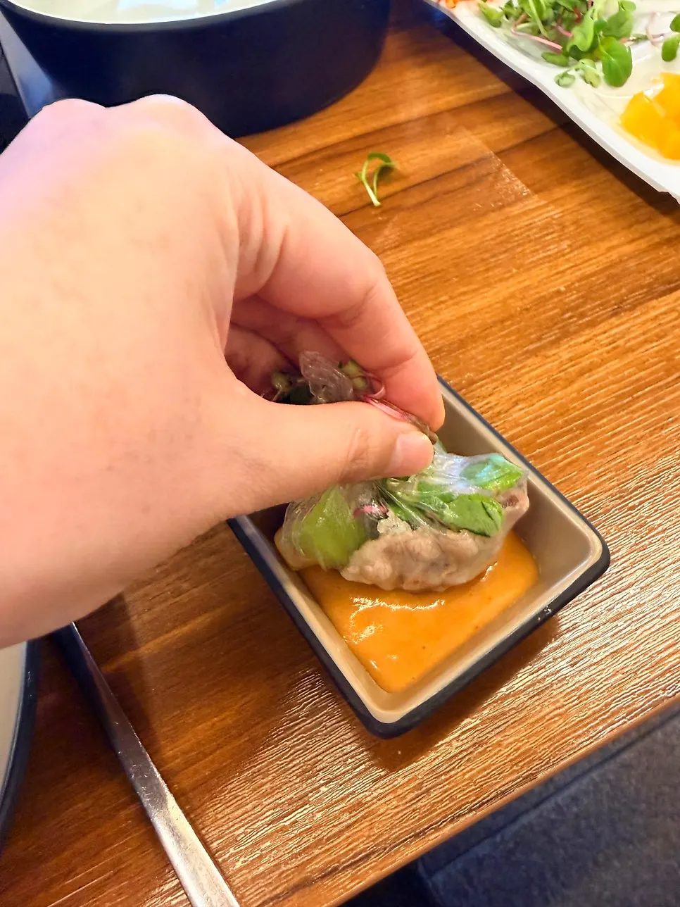 Rice paper topped with meat and vegetables for a wrap