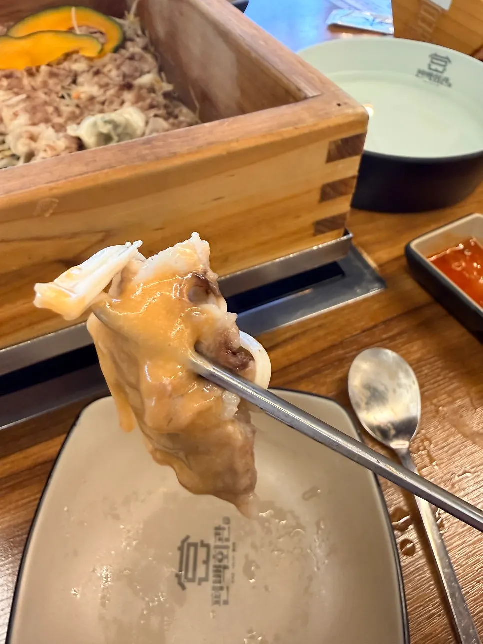 Soft dumplings served together with the cypress steam