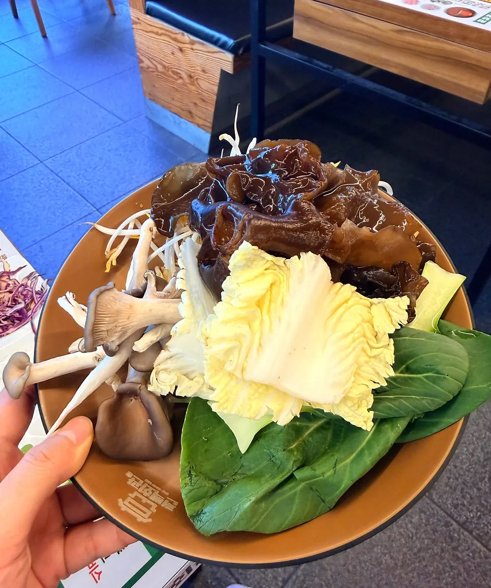 Pot of half-and-half katsuo and beef bone mala shabu-shabu broth