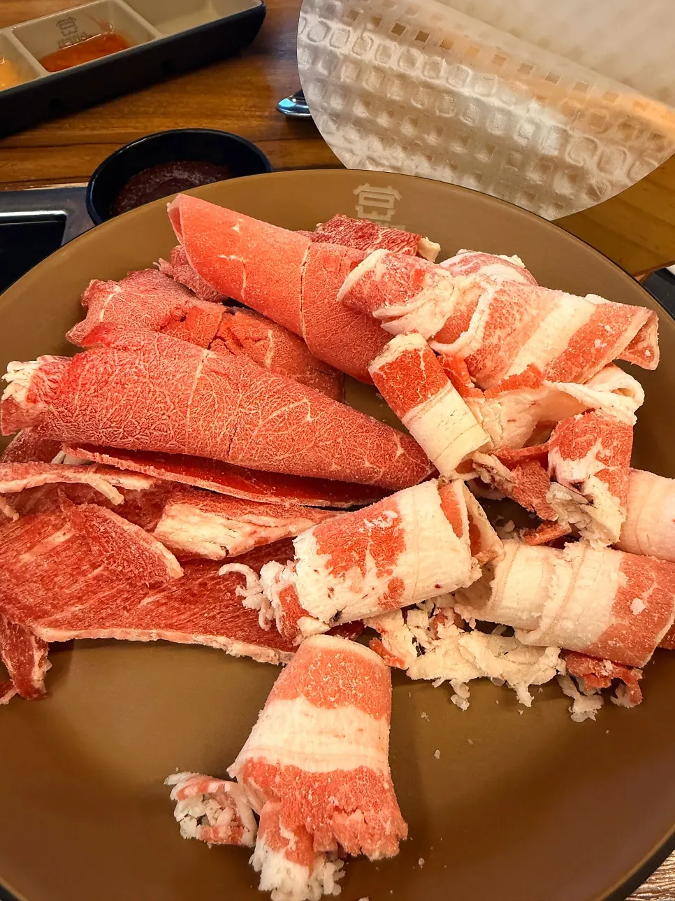 The half-and-half broth starting to boil