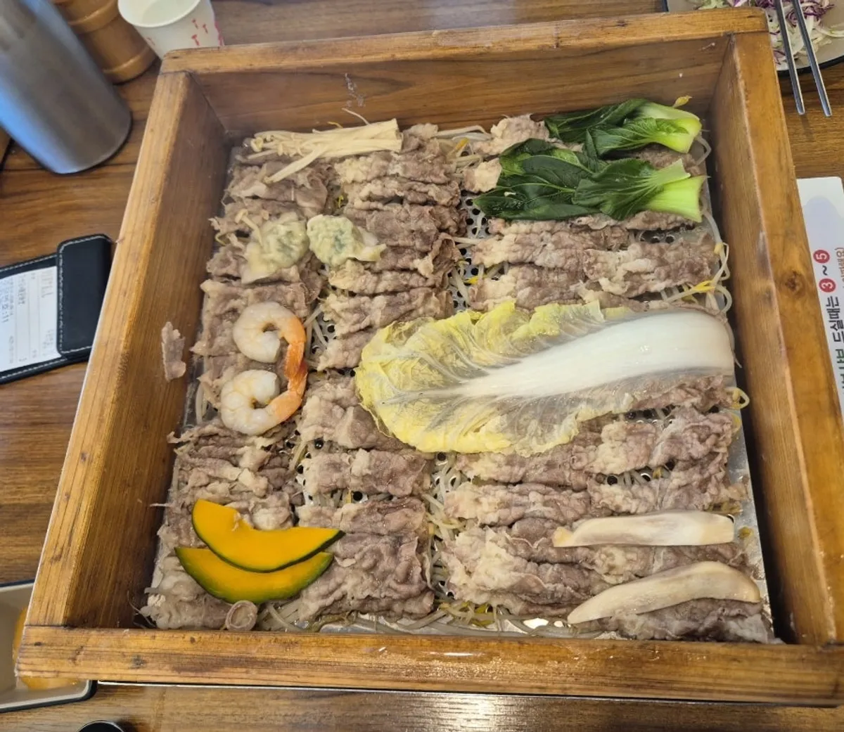 Steamer filled with beef and vegetables for cypress steam