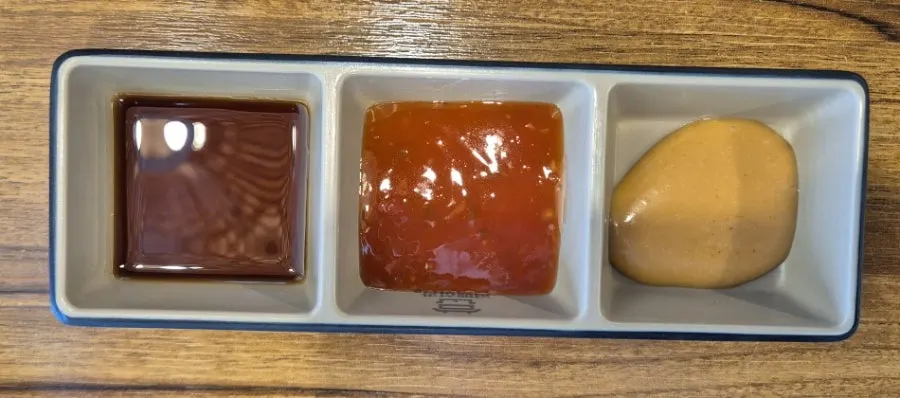 Three sauces served with the cypress steam