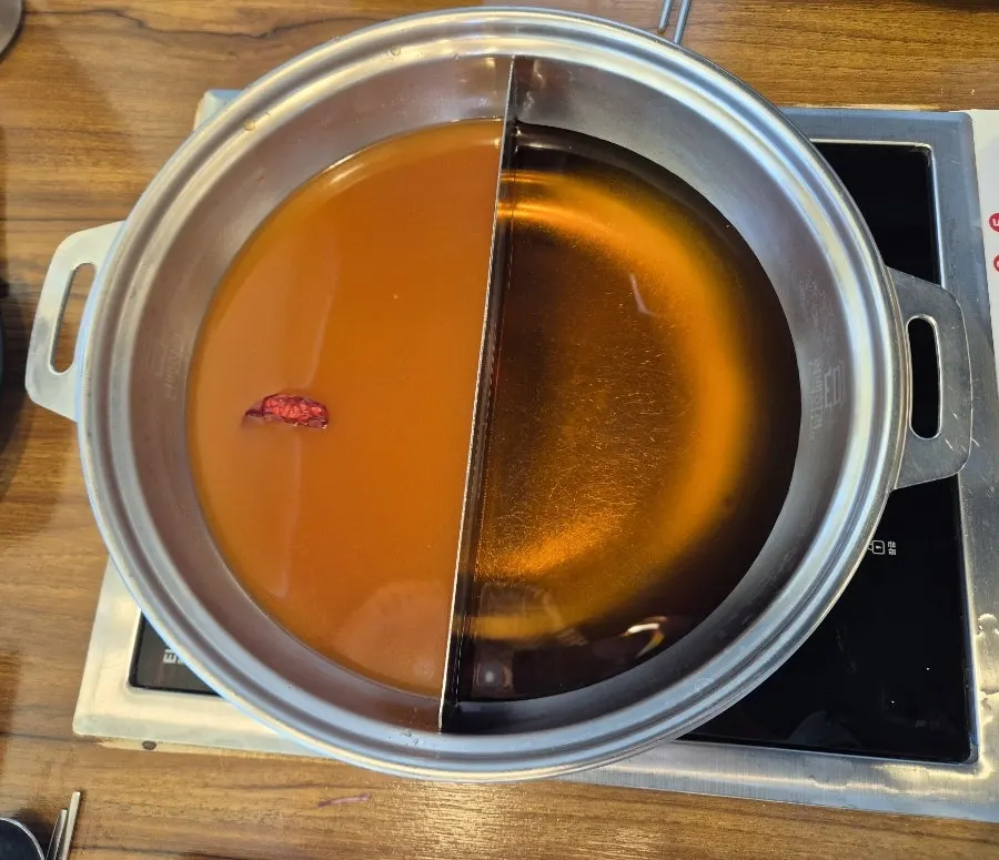Pots of katsuo and spicy mushroom broth