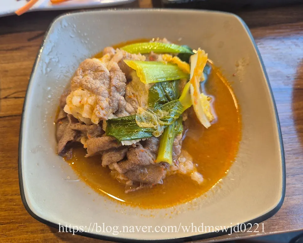 Usamgyeop beef and vegetables simmering in the shabu-shabu pot