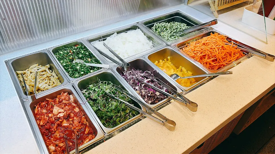 Self-serve bar with dumplings, sujebi, and glass noodles