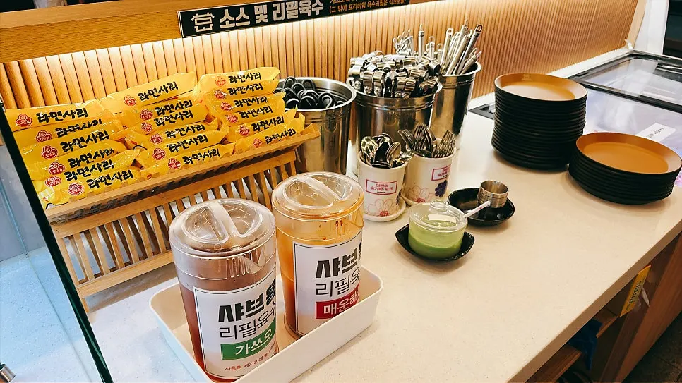 Self-serve bar with rice-paper roll ingredients and ramyeon noodles