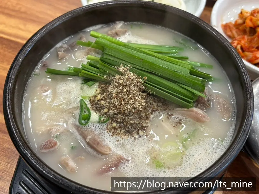 Pyeongando sundae-guk topped with chives and perilla powder