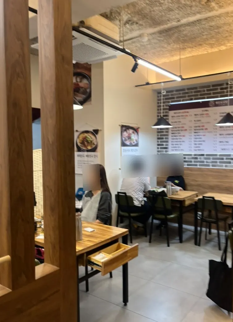 Seats near the entrance with a solo diner