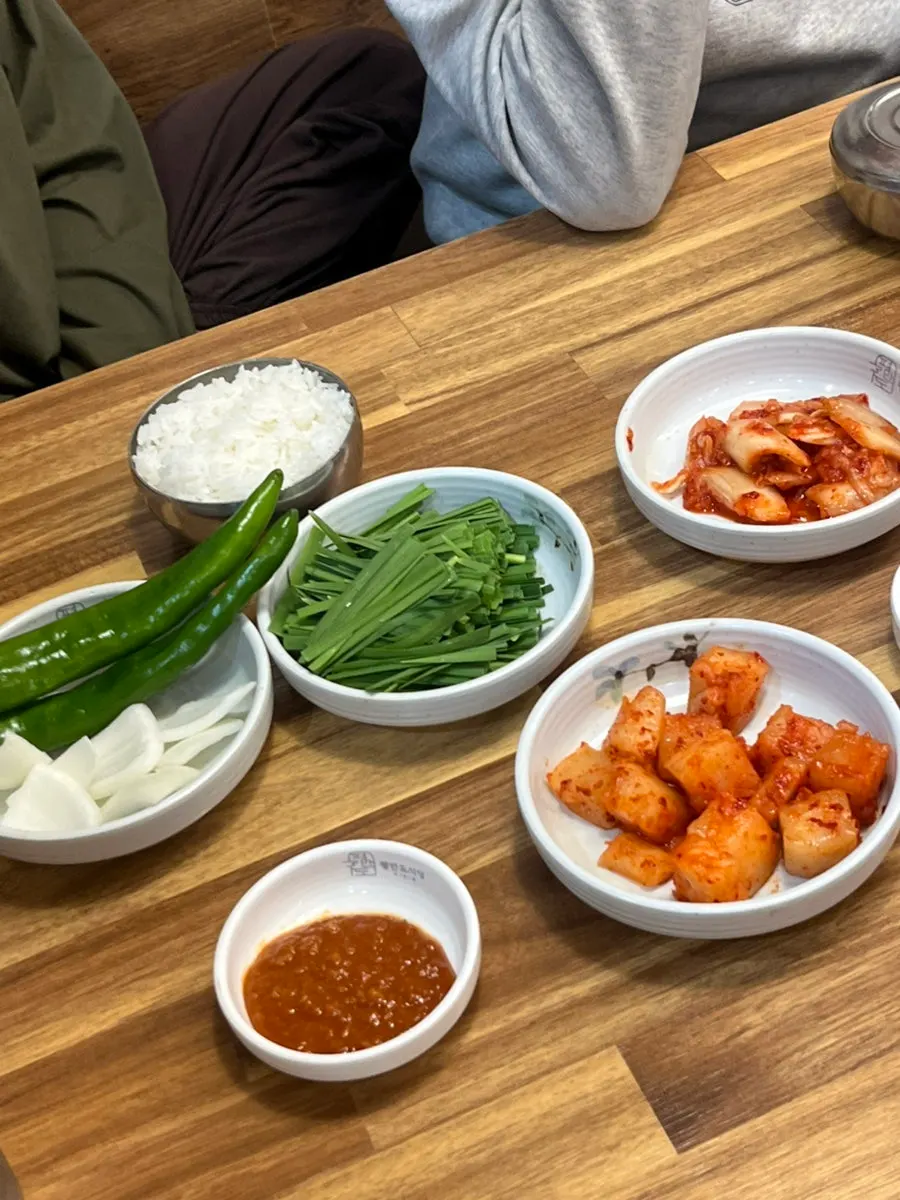 Table set with three soup bowls ordered by the family