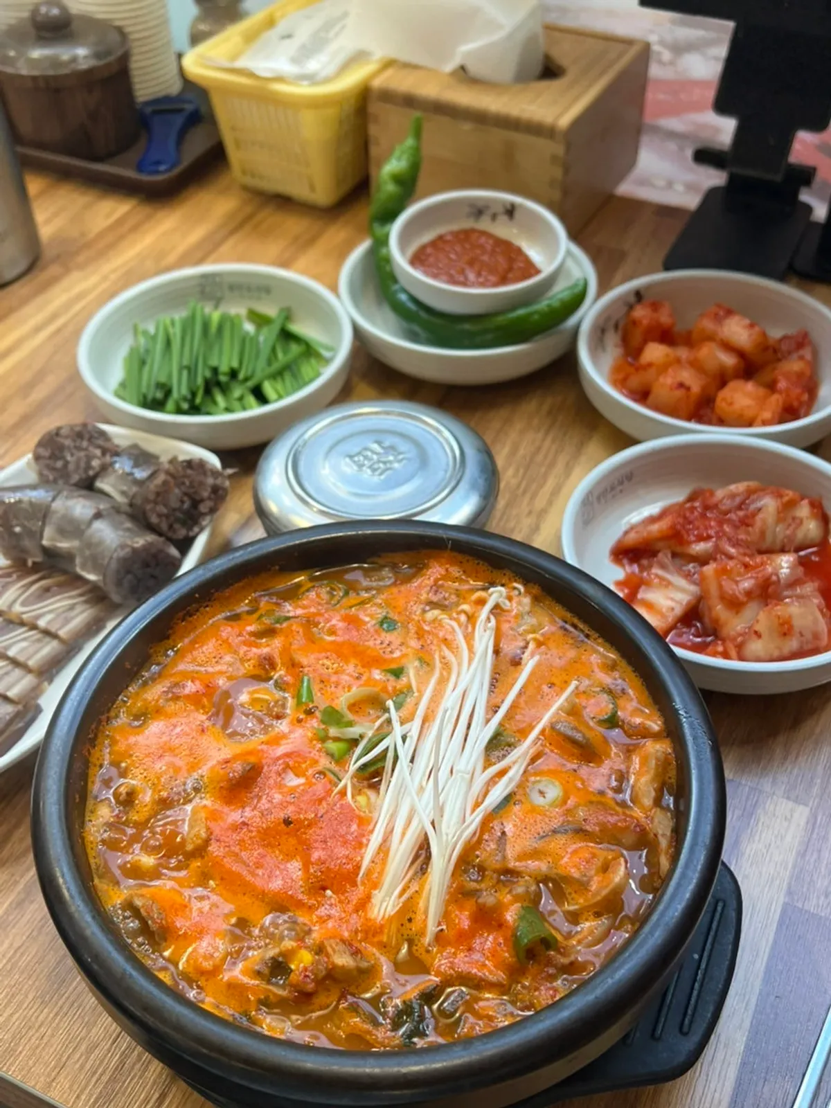 Full spread of the spicy haejang-guk set