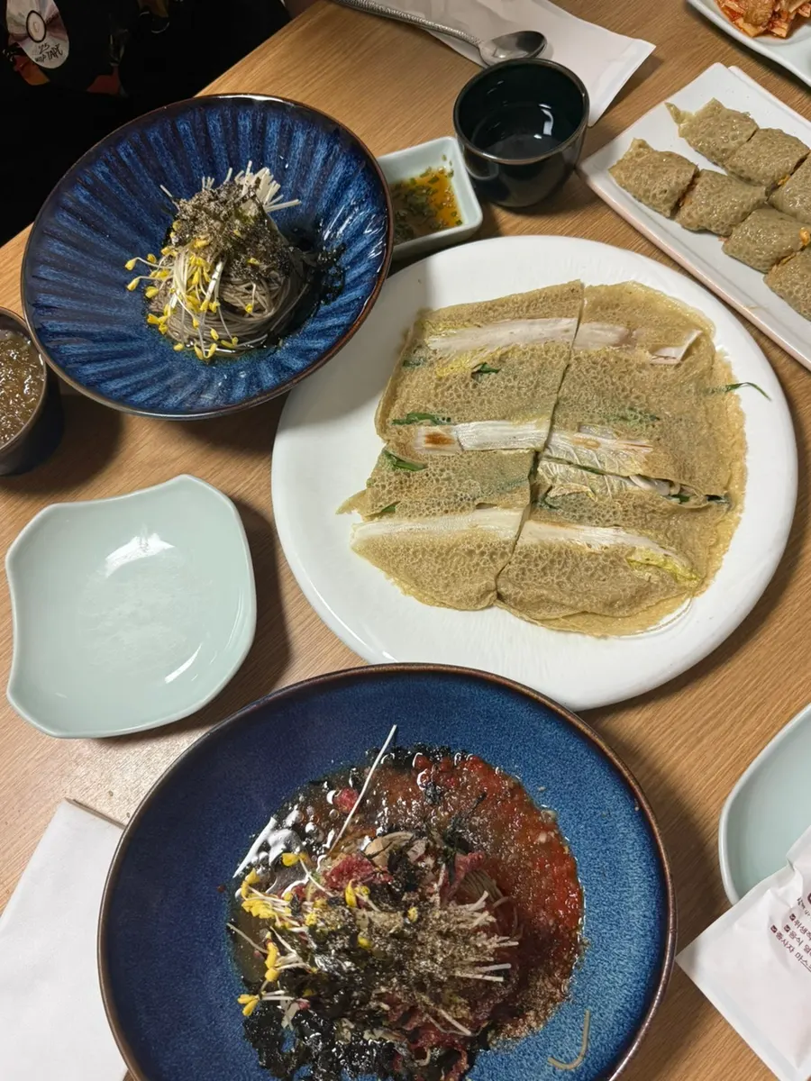 Table setting with buckwheat pancake and crepe together