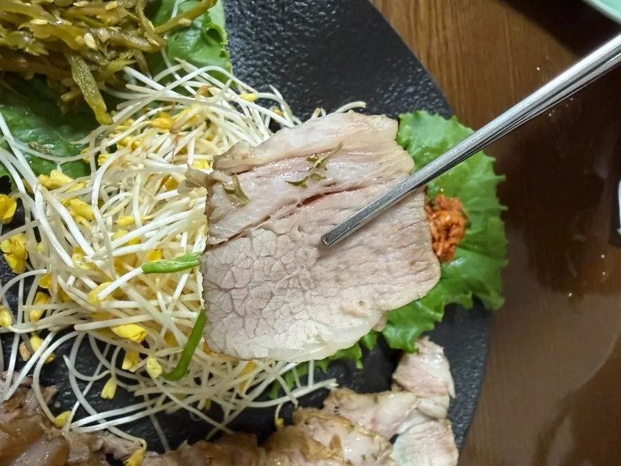 Suyuk served with pickled shredded chili and salted shrimp