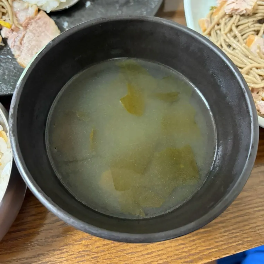Suyuk wrapped together with buckwheat sprouts
