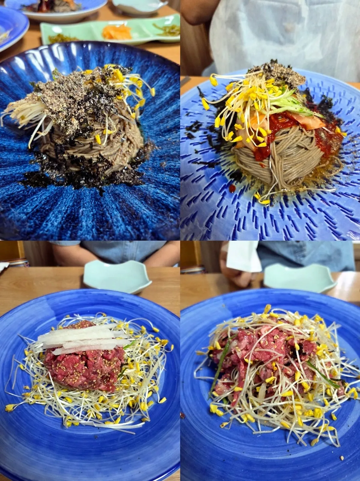 A full table at Bongpyeong Memil Migayeon with buckwheat noodles and buckwheat sprout beef tartare